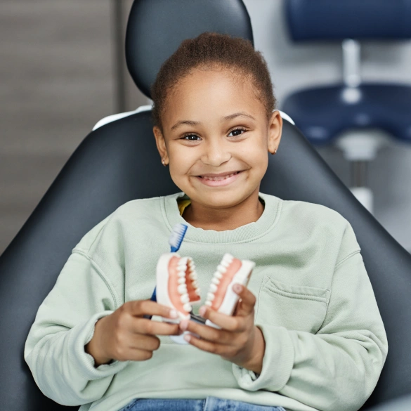 Child receiving pediatric dental treatment